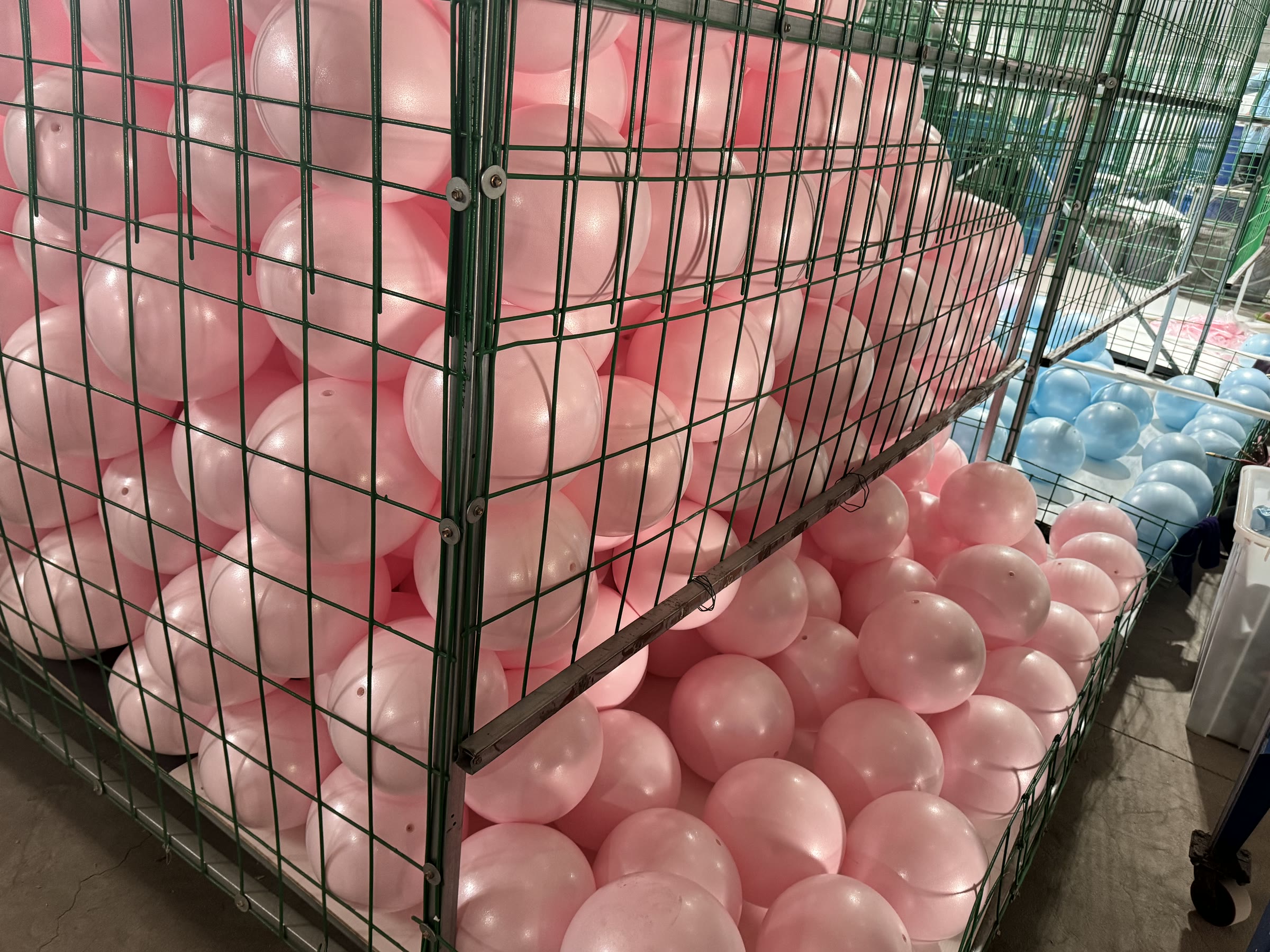 Large pink and blue mini Pilates ball batches in WENKU's workshop